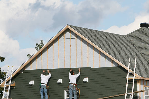 Professional Siding technician working in Star, NC